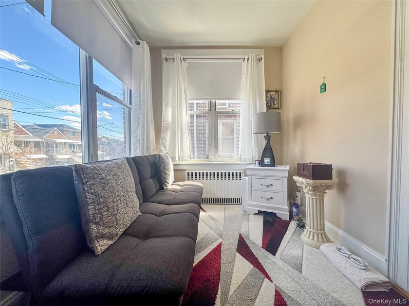 Welcome to 2021 Haight Avenue, a detached brick two family home - photo 5