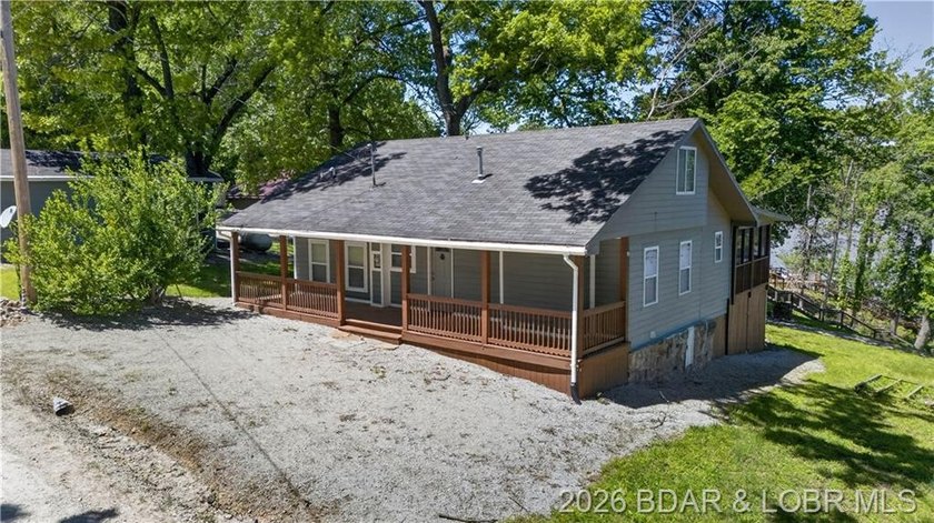 Take a look at this beautiful 4-bedroom, 2-bath home at the Lake - photo 11