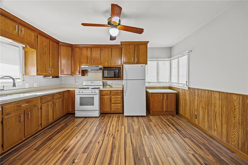 This updated cape cod style home offers comfort and modern charm - photo 12