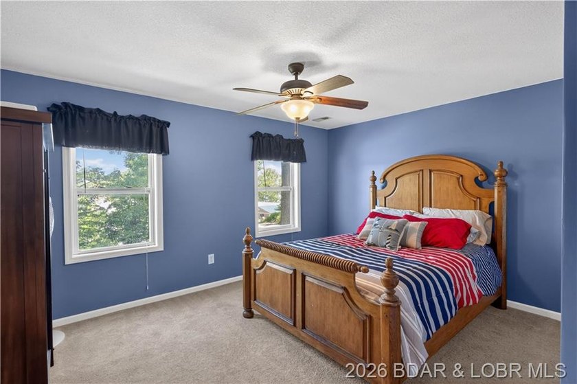 Take a look at this beautiful 4-bedroom, 2-bath home at the Lake - photo 26