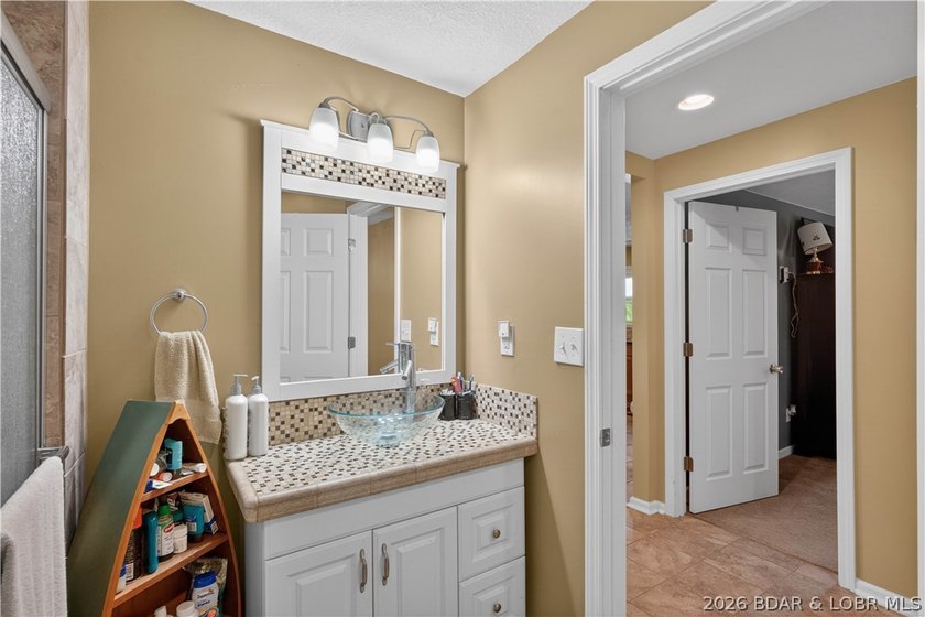 Take a look at this beautiful 4-bedroom, 2-bath home at the Lake - photo 34