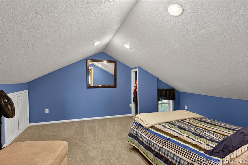 Take a look at this beautiful 4-bedroom, 2-bath home at the Lake - photo 35