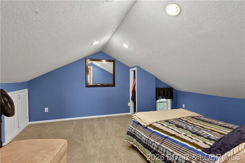 Take a look at this beautiful 4-bedroom, 2-bath home at the Lake - photo 35