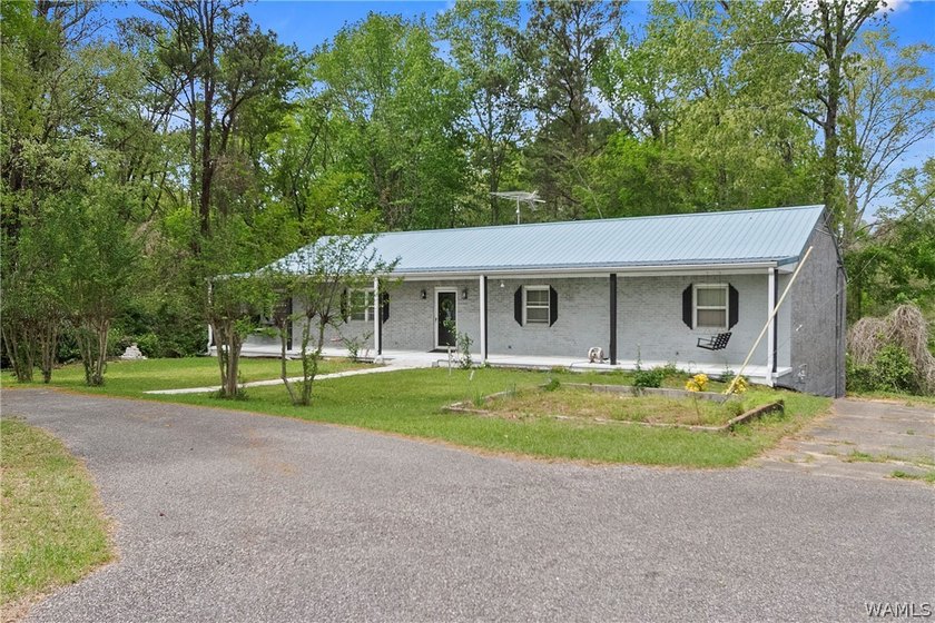 This spacious 6-bedroom, 4-bathroom home offers over 3,360 sq ft - photo 2