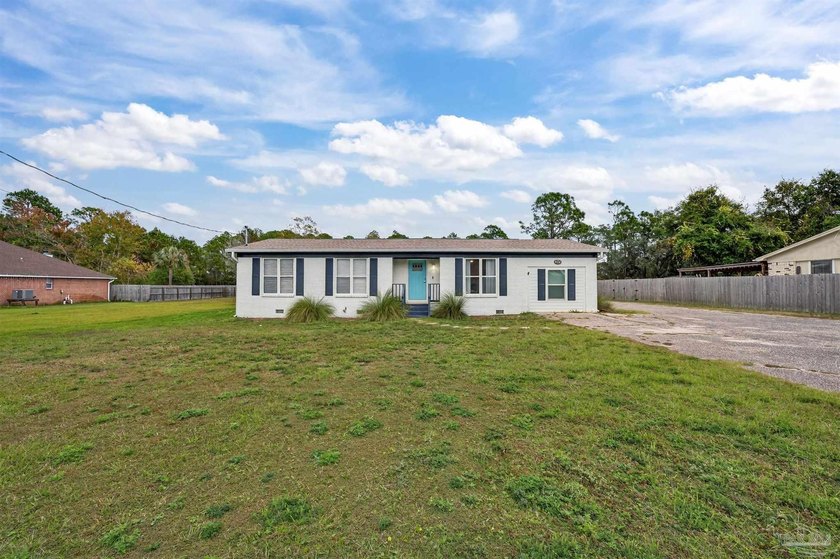 This stunning home, situated on three generous lots totaling 0 - photo 3