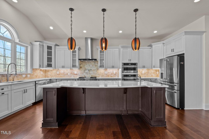 Situated on a premium 0.89-acre lot in Wake Forest's highly - photo 20