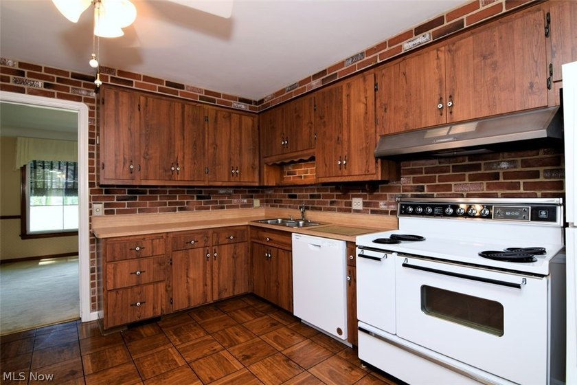 This charming and well maintained brick home has been in the - photo 15