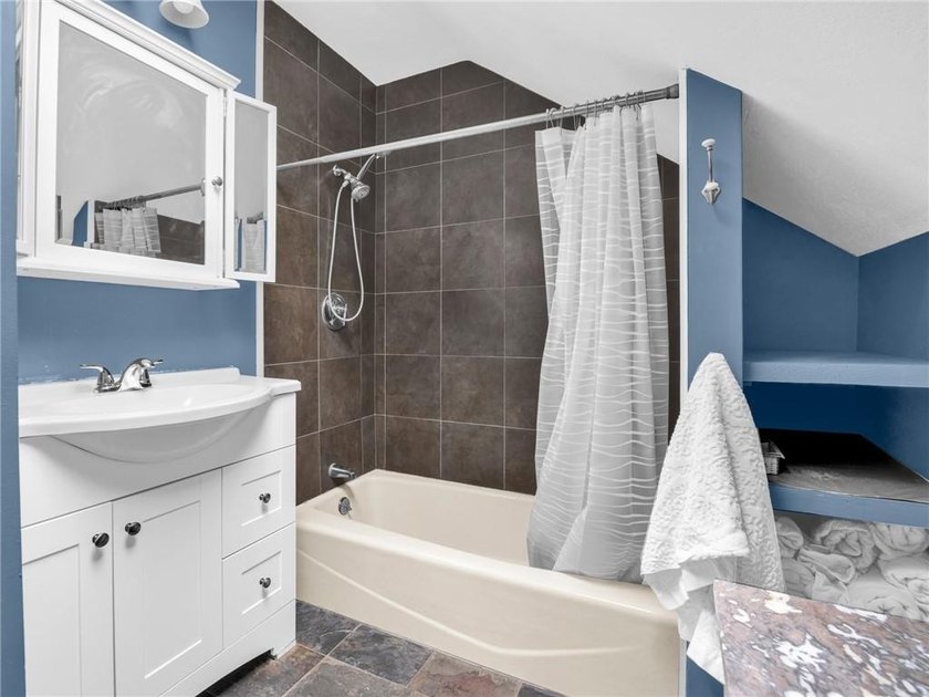 Enjoy coastal living with water views and beach access just a - photo 18