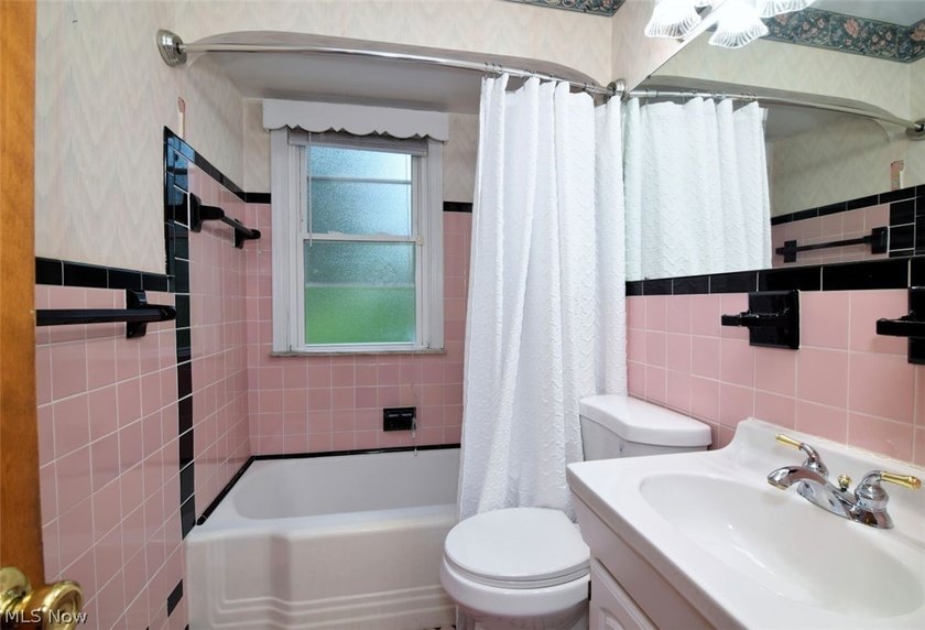 This charming and well maintained brick home has been in the - photo 20