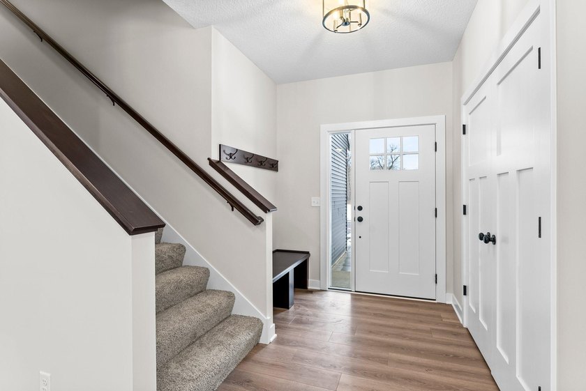 This stunning two-story new construction offers a perfect blend - photo 3