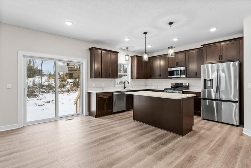This stunning two-story new construction offers a perfect blend - photo 9