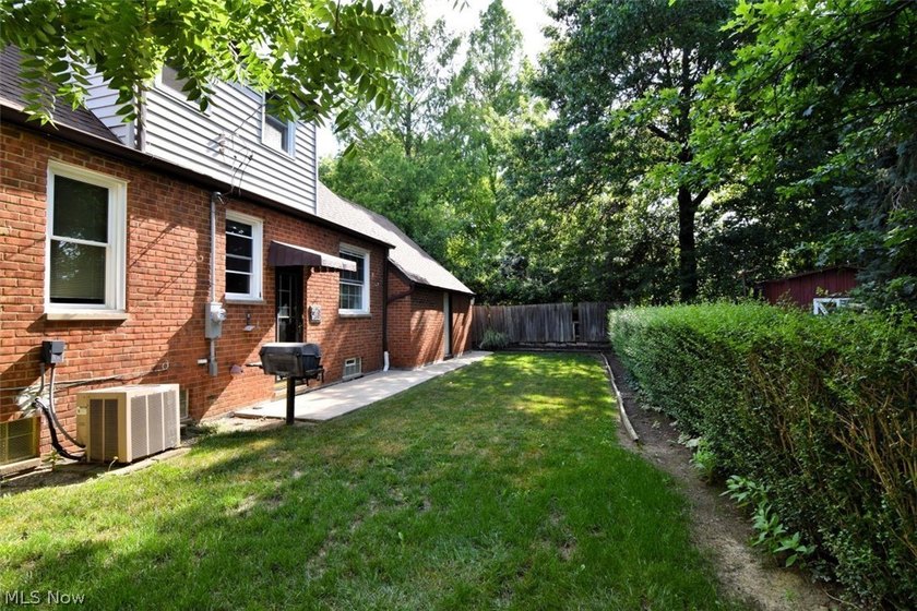 This charming and well maintained brick home has been in the - photo 34