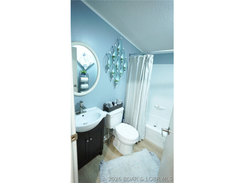 Welcome to your lakefront retreat! This super cute, updated 4 - photo 35