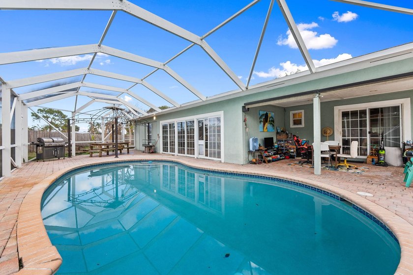 Explore this 4 Bed, 2 Bath pool home offering 1,800 sq ft under - photo 15