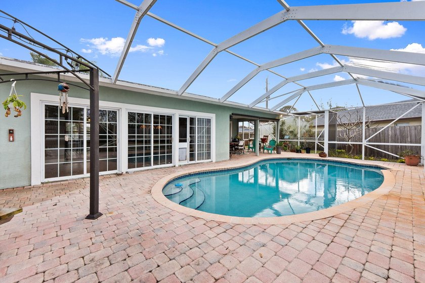 Explore this 4 Bed, 2 Bath pool home offering 1,800 sq ft under - photo 16