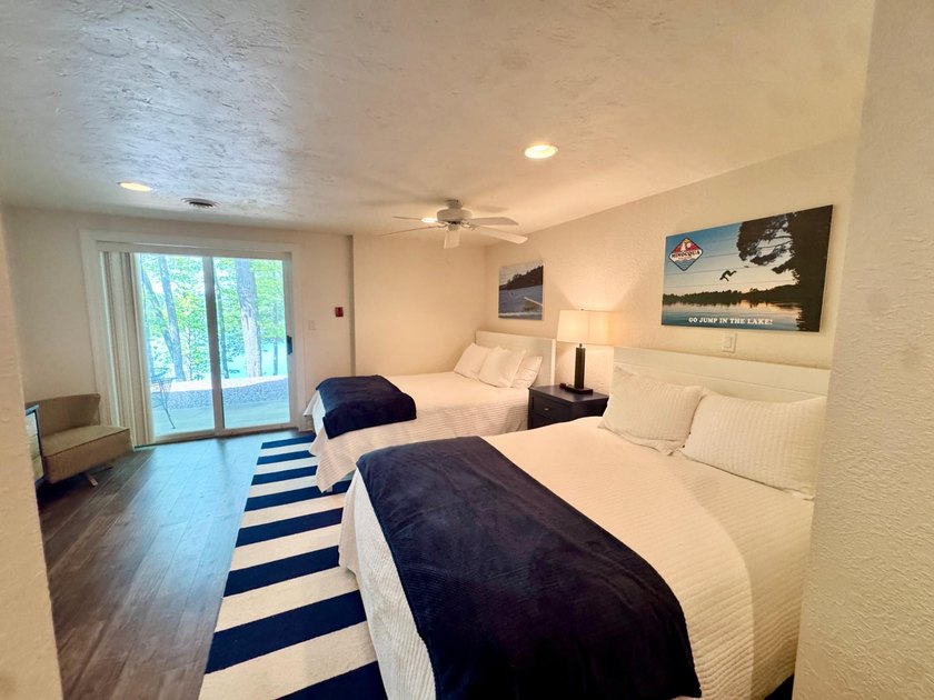 Experience exceptional Northwoods lakefront living with this - photo 17