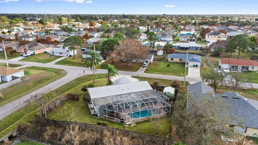 Explore this 4 Bed, 2 Bath pool home offering 1,800 sq ft under - photo 37