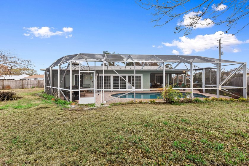 Explore this 4 Bed, 2 Bath pool home offering 1,800 sq ft under - photo 39