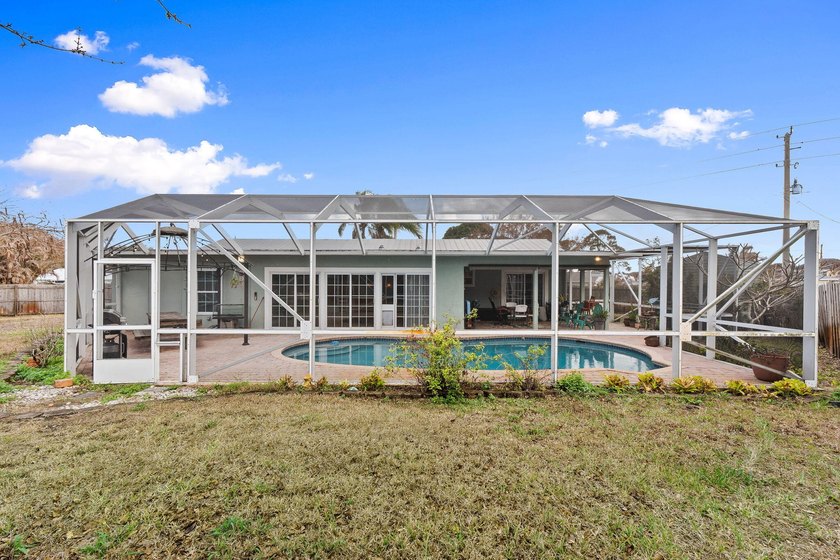 Explore this 4 Bed, 2 Bath pool home offering 1,800 sq ft under - photo 40