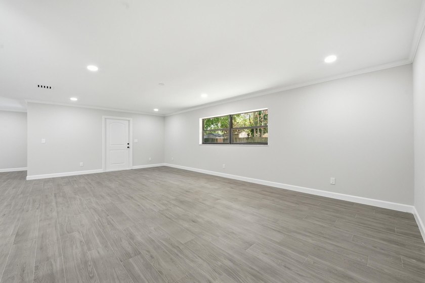 Fully remodeled 3-bedroom, 2-bath home with an attached garage - photo 11