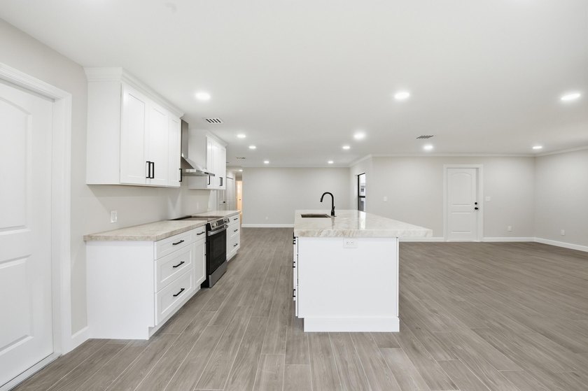 Fully remodeled 3-bedroom, 2-bath home with an attached garage - photo 13