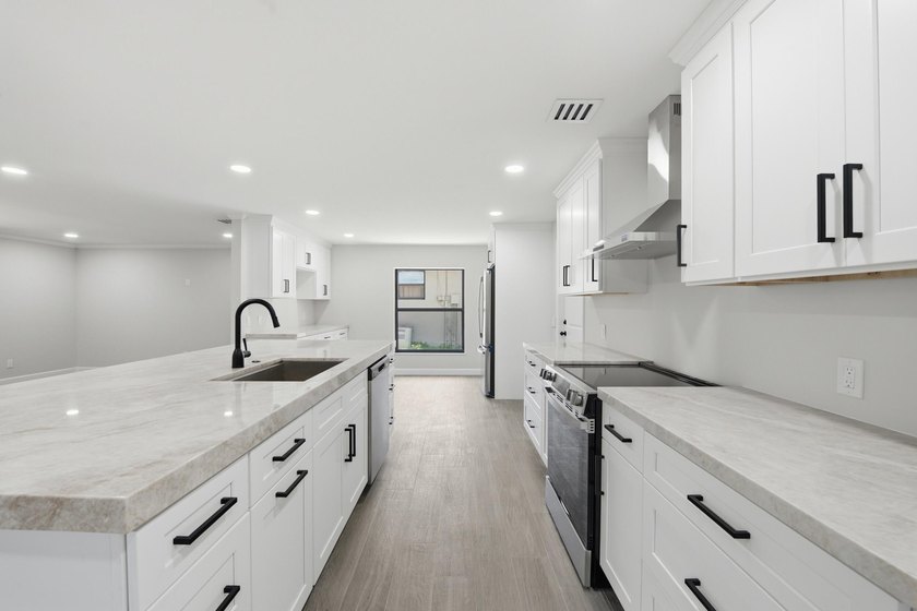 Fully remodeled 3-bedroom, 2-bath home with an attached garage - photo 16