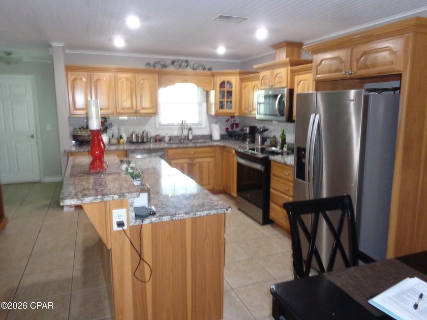 REDUCED -- REDUCED --IMMACULATE - UPDATED - THIS SPACIOUS - photo 11