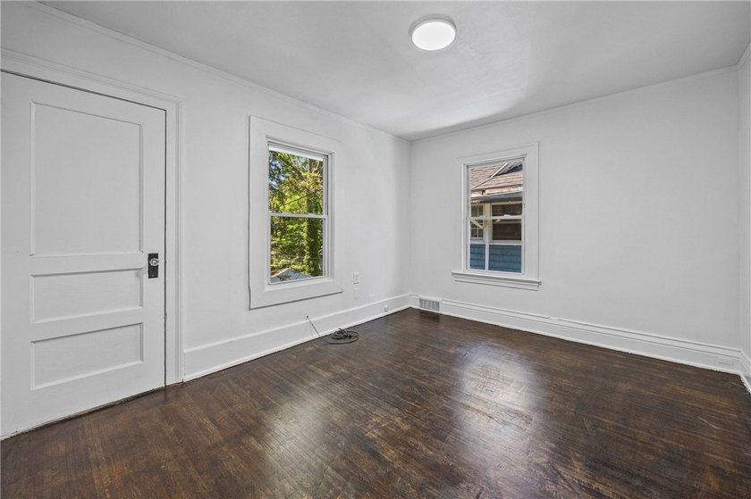 Welcome home to this beautifully updated duplex on the edge of - photo 34