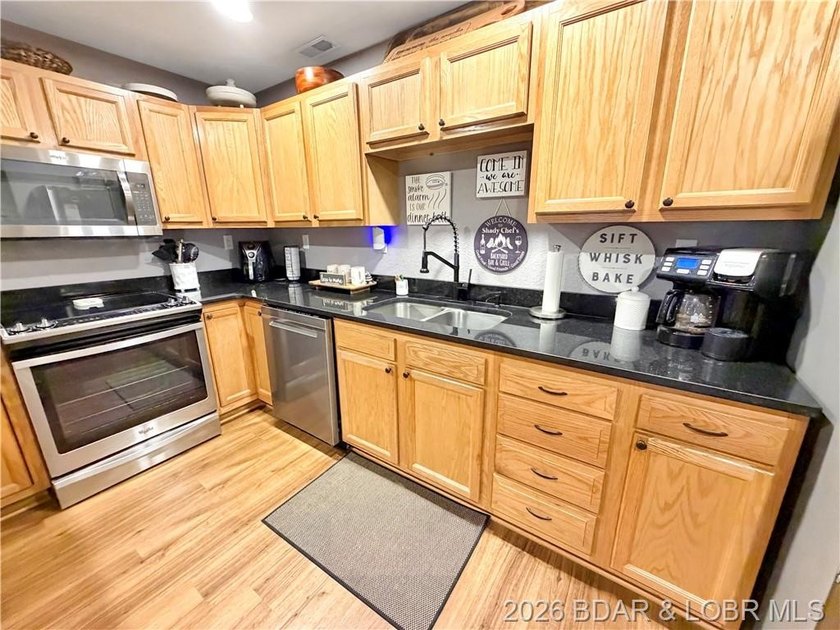 Lake-view property featuring a main residence(28251 Shore Rd) - photo 34