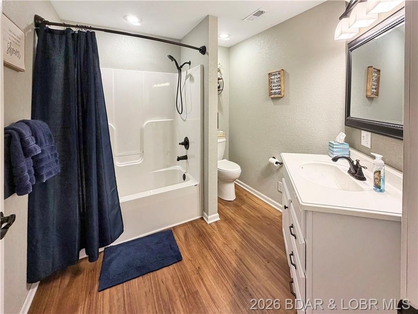 Lake-view property featuring a main residence(28251 Shore Rd) - photo 38
