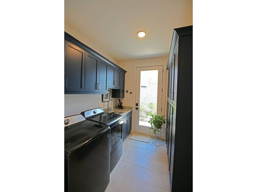 Where Lakefront Luxury Meets Timeless Design. 524 Grand Harbor - photo 9