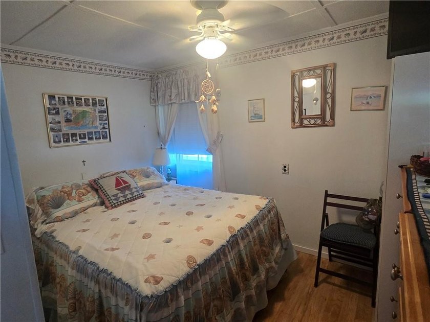Rare 3 bed 1 bath waterfront cottage on Potter Pond!!! Located - photo 12