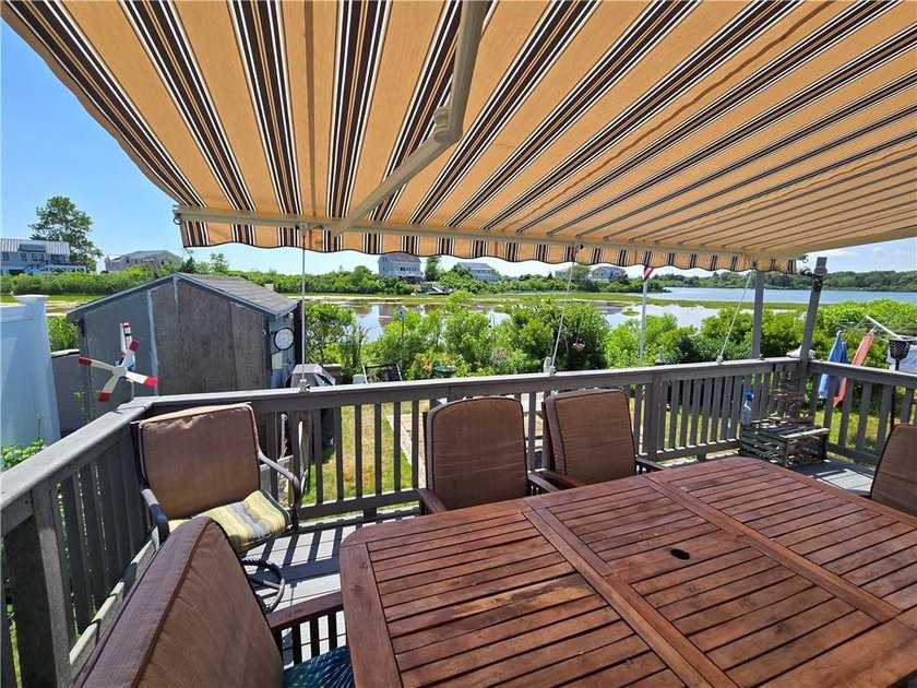 Rare 3 bed 1 bath waterfront cottage on Potter Pond!!! Located - photo 22