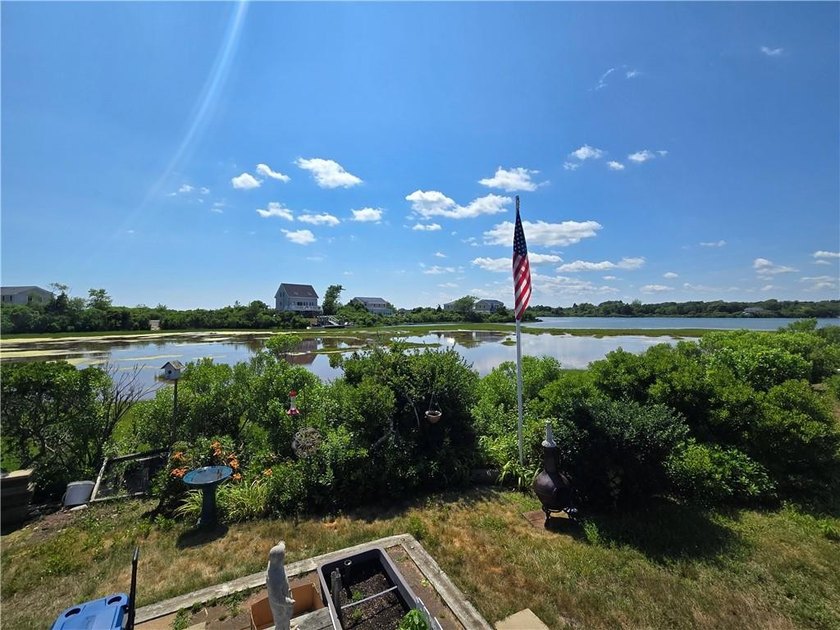 Rare 3 bed 1 bath waterfront cottage on Potter Pond!!! Located - photo 23