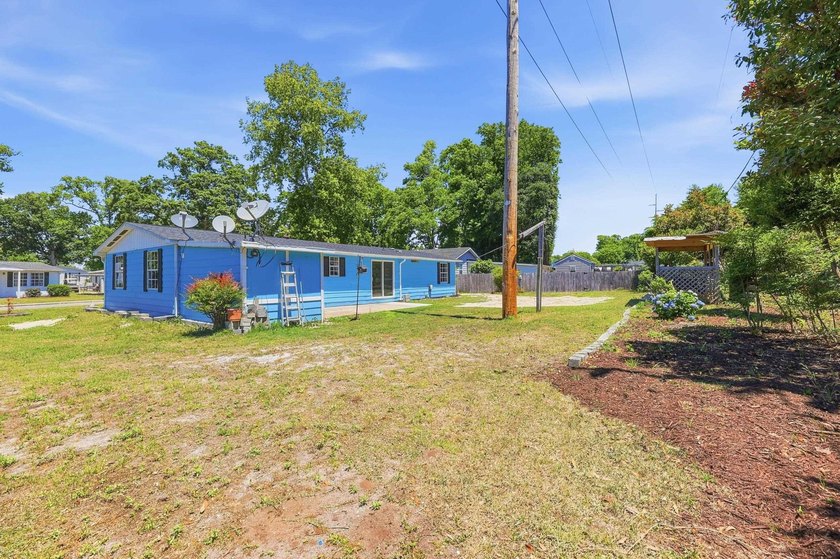 Coastal living in the highly sought-after Windy Hill section of - photo 24