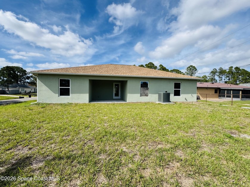 This beautifully built 2022 concrete block home sits on a - photo 2