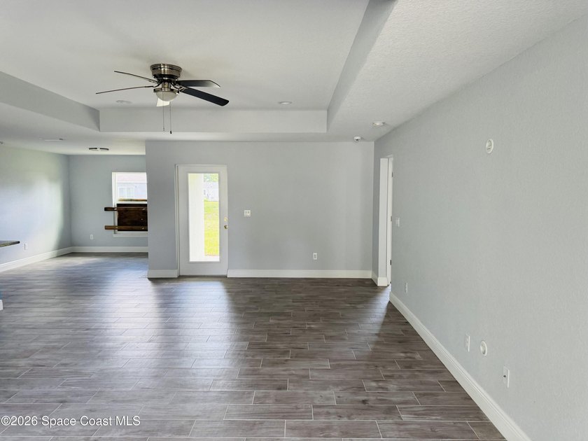 This beautifully built 2022 concrete block home sits on a - photo 3
