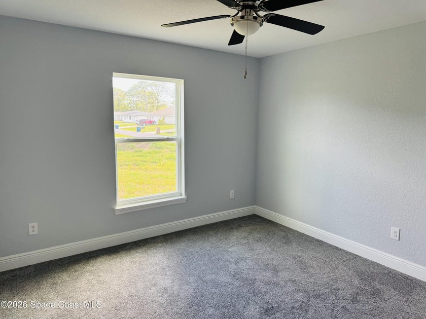 This beautifully built 2022 concrete block home sits on a - photo 5