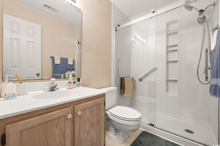 MOVE IN READY! FULLY FURNISHED! This beautiful end unit condo is - photo 12