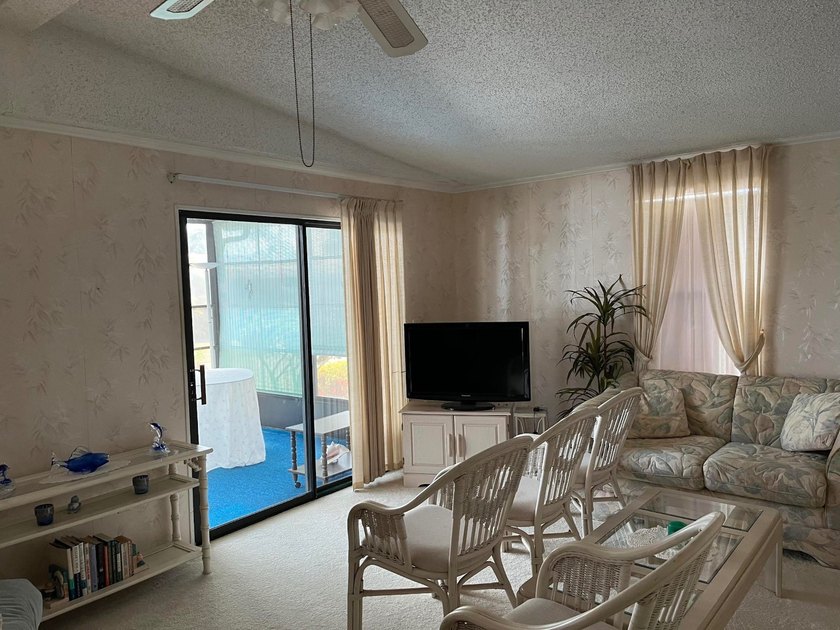 Located in the desirable 55+ community of Country Lakes Village - photo 8