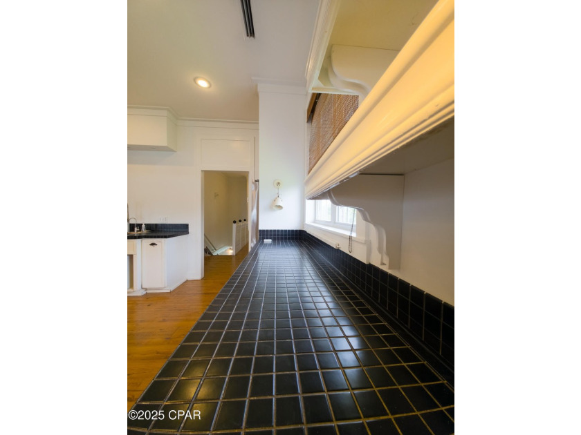 Custom-built in 2004 on 9' pilings with 4' of fill, this 2,172 - photo 29