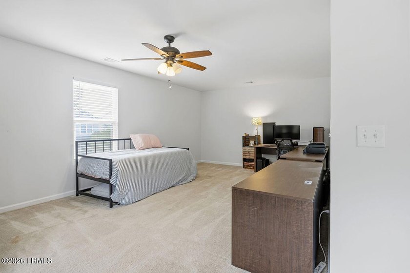 Welcome to this spacious 3-bedroom, 2.5-bath home with a 2-car - photo 50