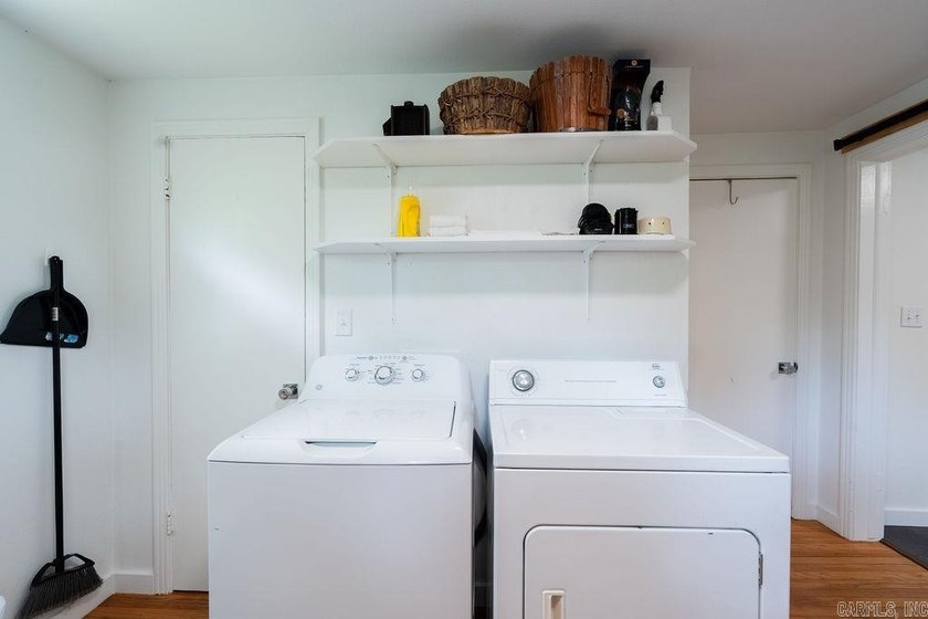 1323 W Searcy Street quietly delivers. Crisp white siding with - photo 15