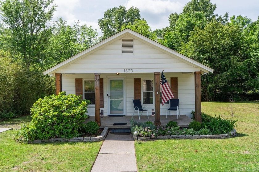 1323 W Searcy Street quietly delivers. Crisp white siding with - photo 35