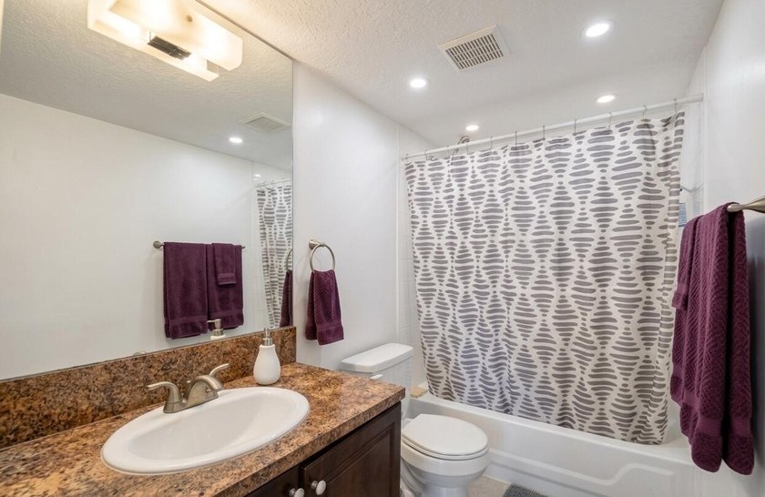 Welcome to this well-appointed two-bedroom, two-bathroom - photo 13