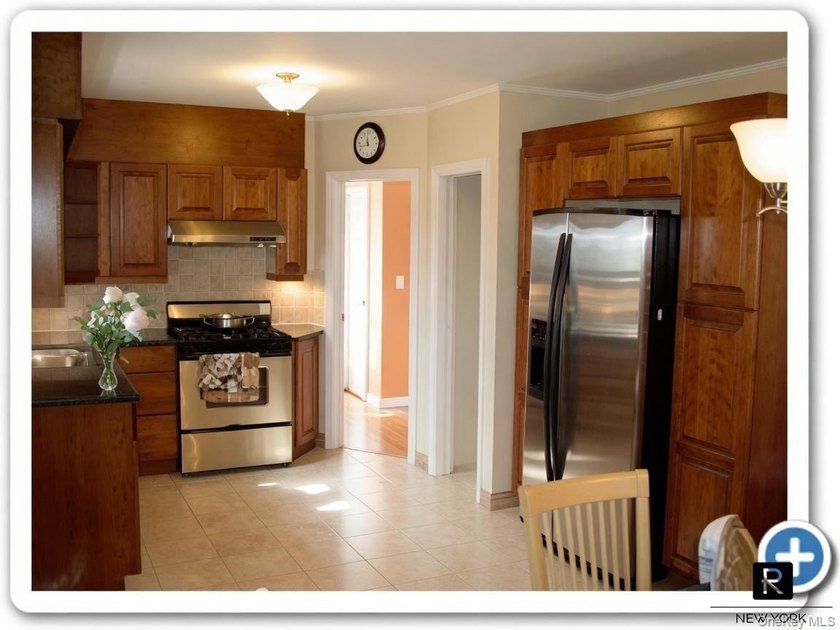 This well-maintained brick two-family home offers an exceptional - photo 18