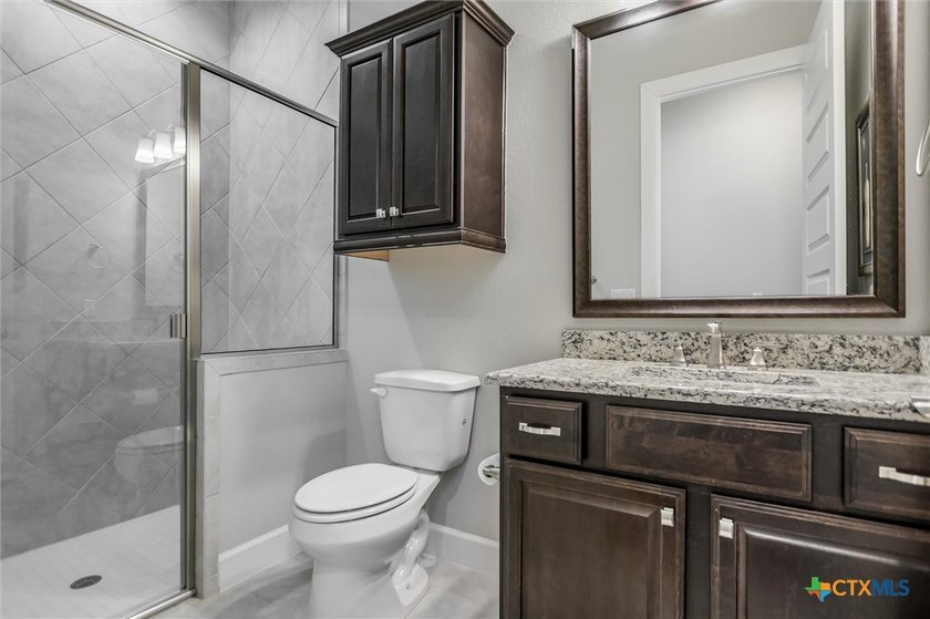 Welcome to this spacious 1,827-square-foot home featuring 2 - photo 11