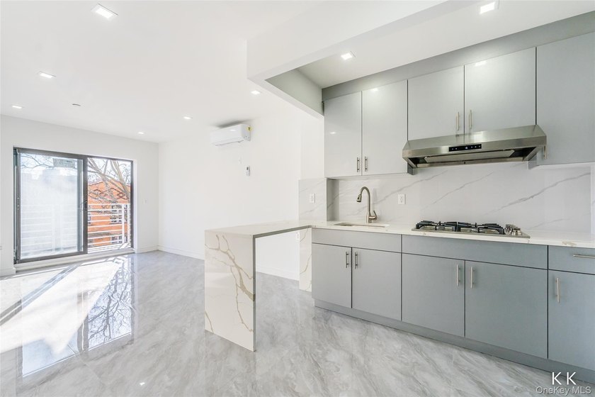The brand-new luxury condo building in Borough Park features an - photo 2