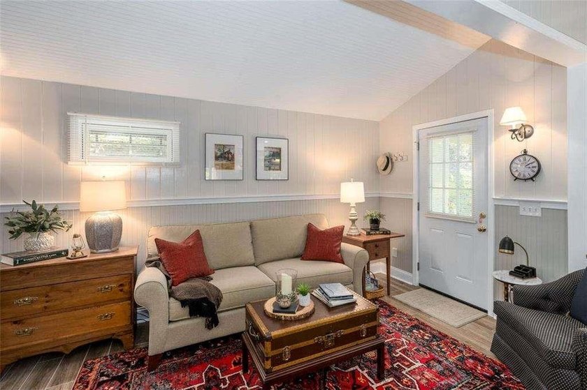 Hidden deep on 20 secluded acres of hardwoods &amp; pine, this - photo 4