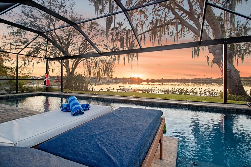 Lakefront living with a proper sunset! Down a private road with - photo 41